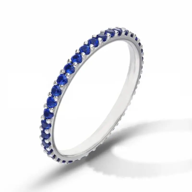anello fede eternity in oro bianco con zirconi blu