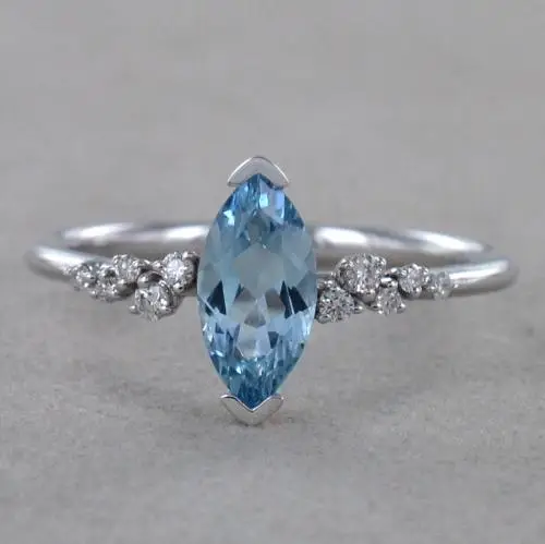 anello in oro bianco con acquamarina taglio marquise e diamanti miniatura 4