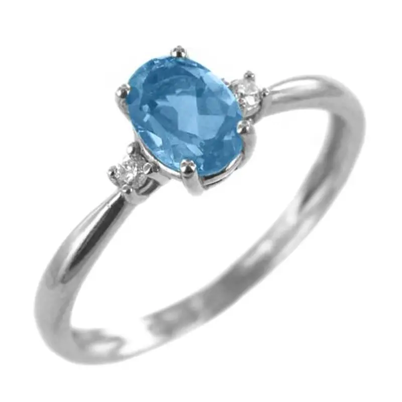 anello in oro bianco con zircone ovale acquamarina e zirconi bianchi