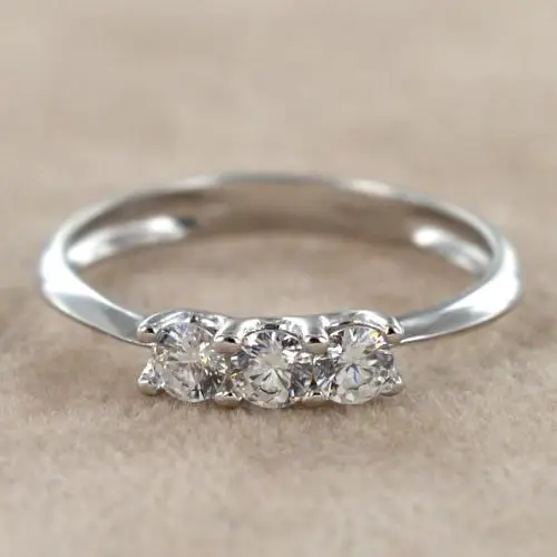 anello trilogy in oro con zirconi miniatura 4