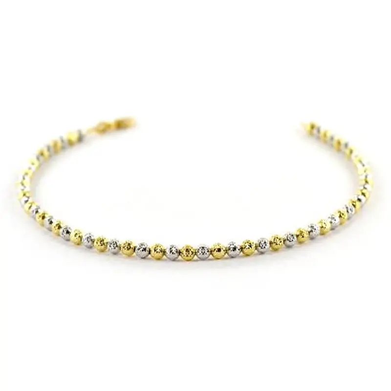 bracciale in oro bianco e giallo a sfere piccole sfaccettate