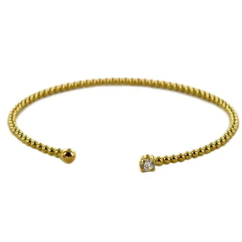 bracciale rigido a sfere in oro giallo e zircone