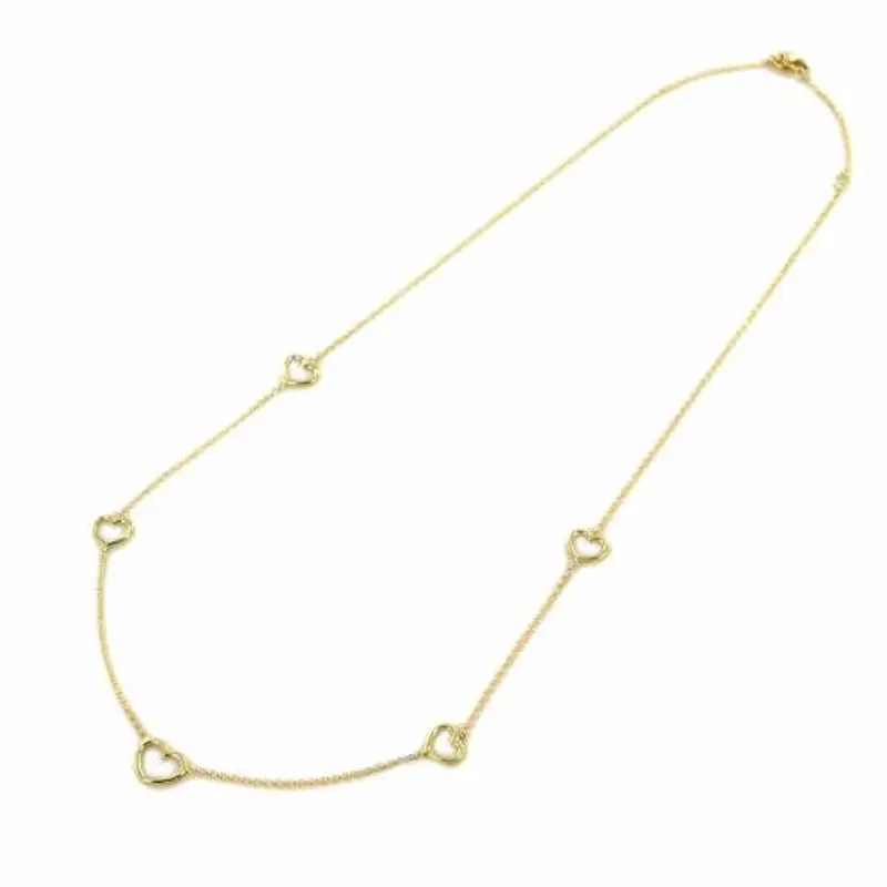 collana con cuori traforati in oro giallo