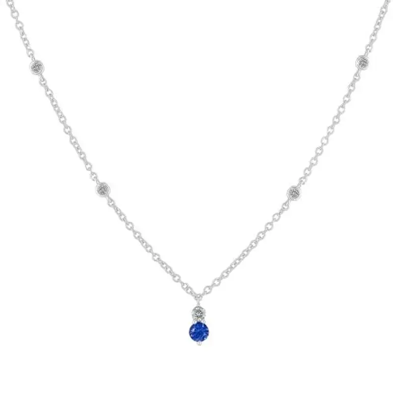 collana in oro bianco con diamanti punto luce e zaffiro rotondo