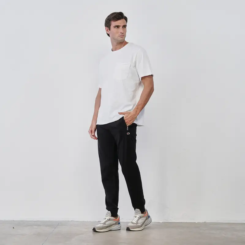 Pantaloni sportivi neri da uomo con logo e polsini