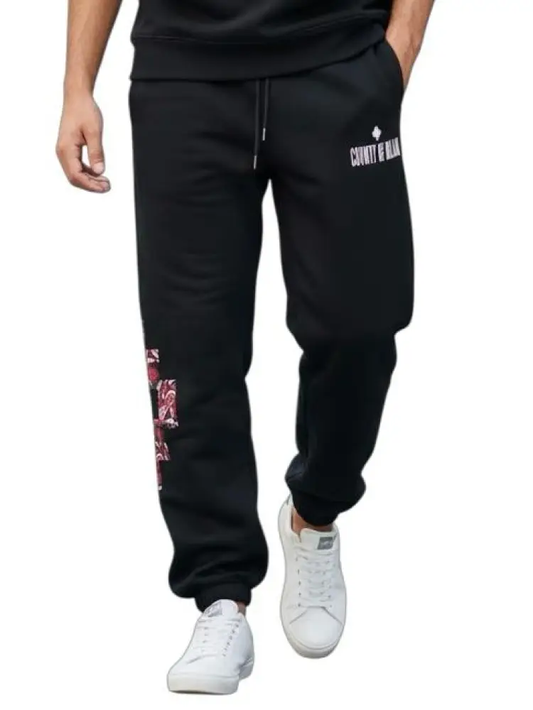 pantalone tuta in cotone nero con stampa snake rossa