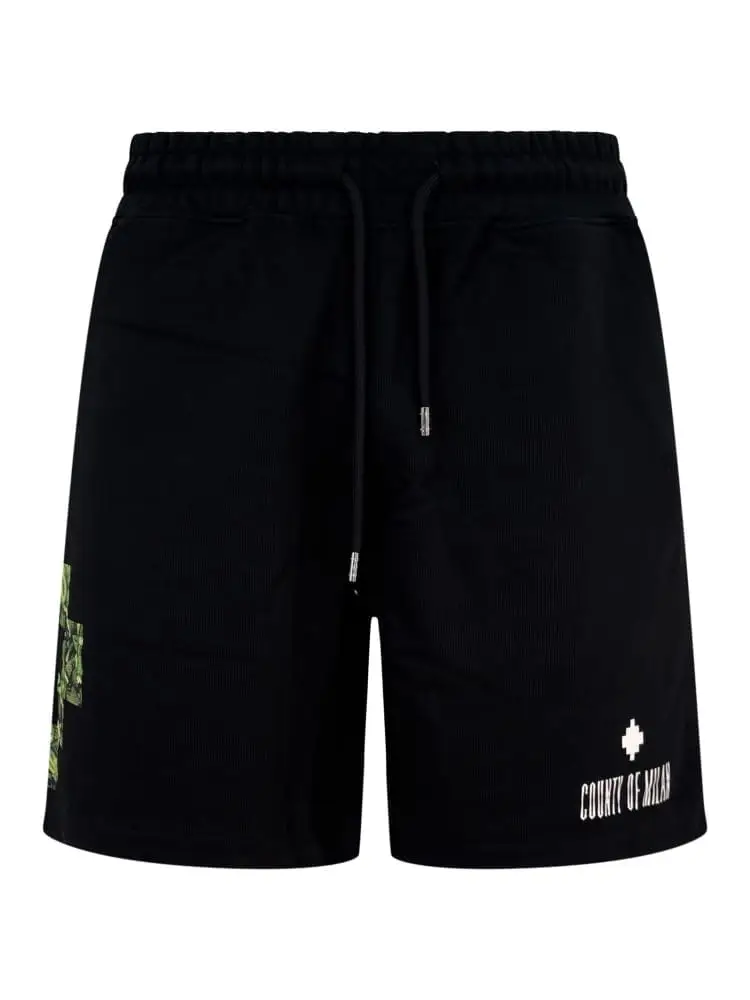 shorts uomo in cotone nero con stampa croce snake verde