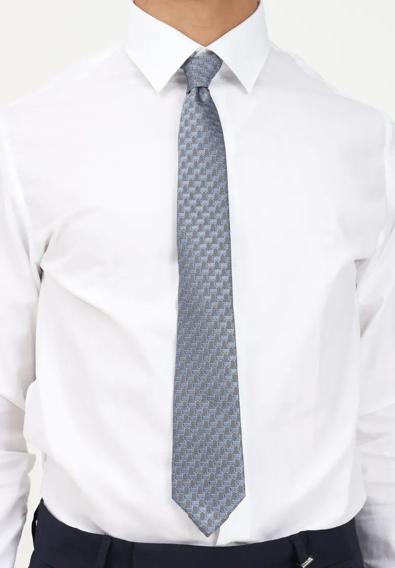 Cravatta azzurra da uomo in seta con micro monogramma L