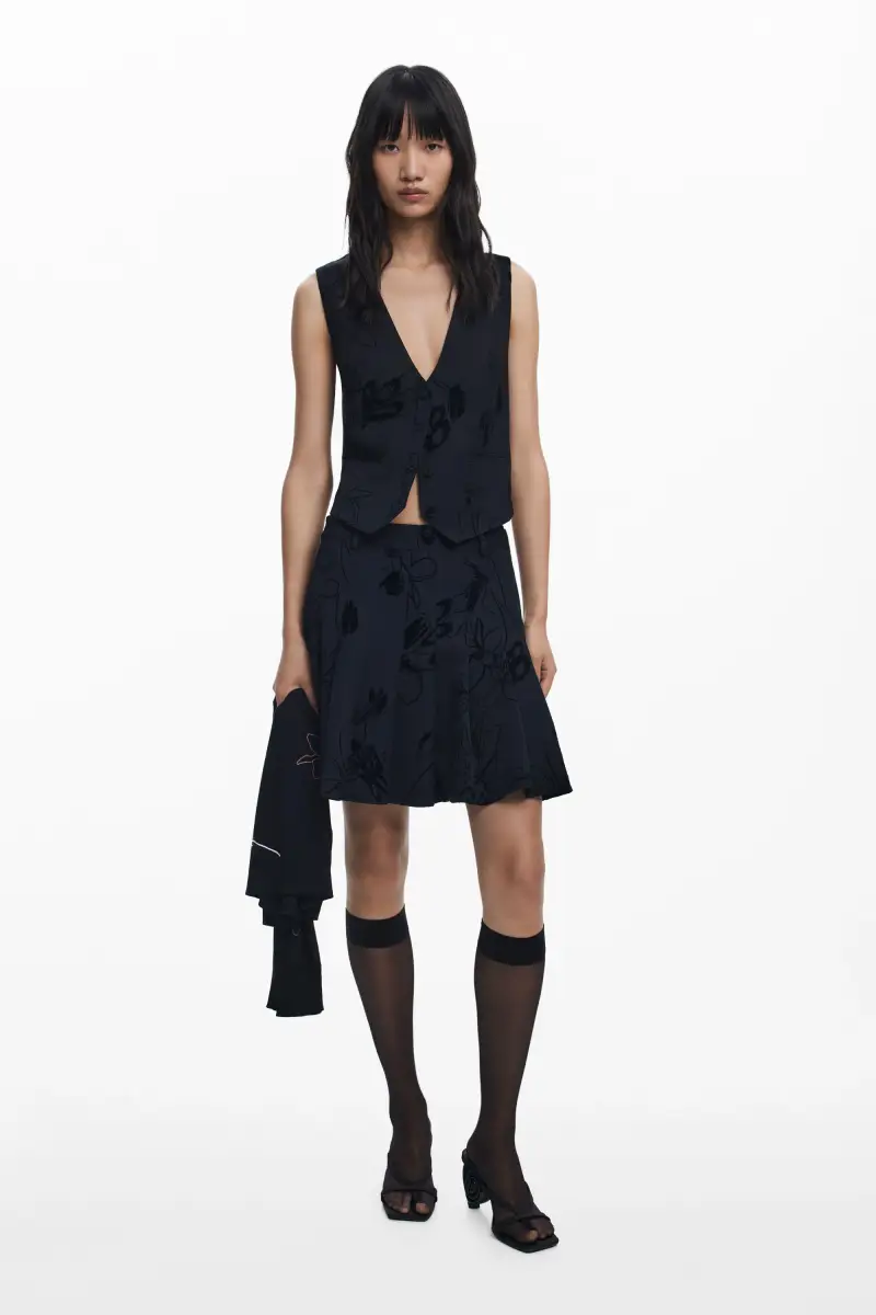 Minigonna a pieghe floccata BLACK