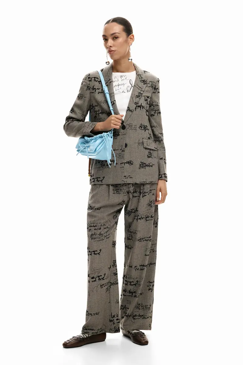 Pantaloni a quadri con lettering BLACK