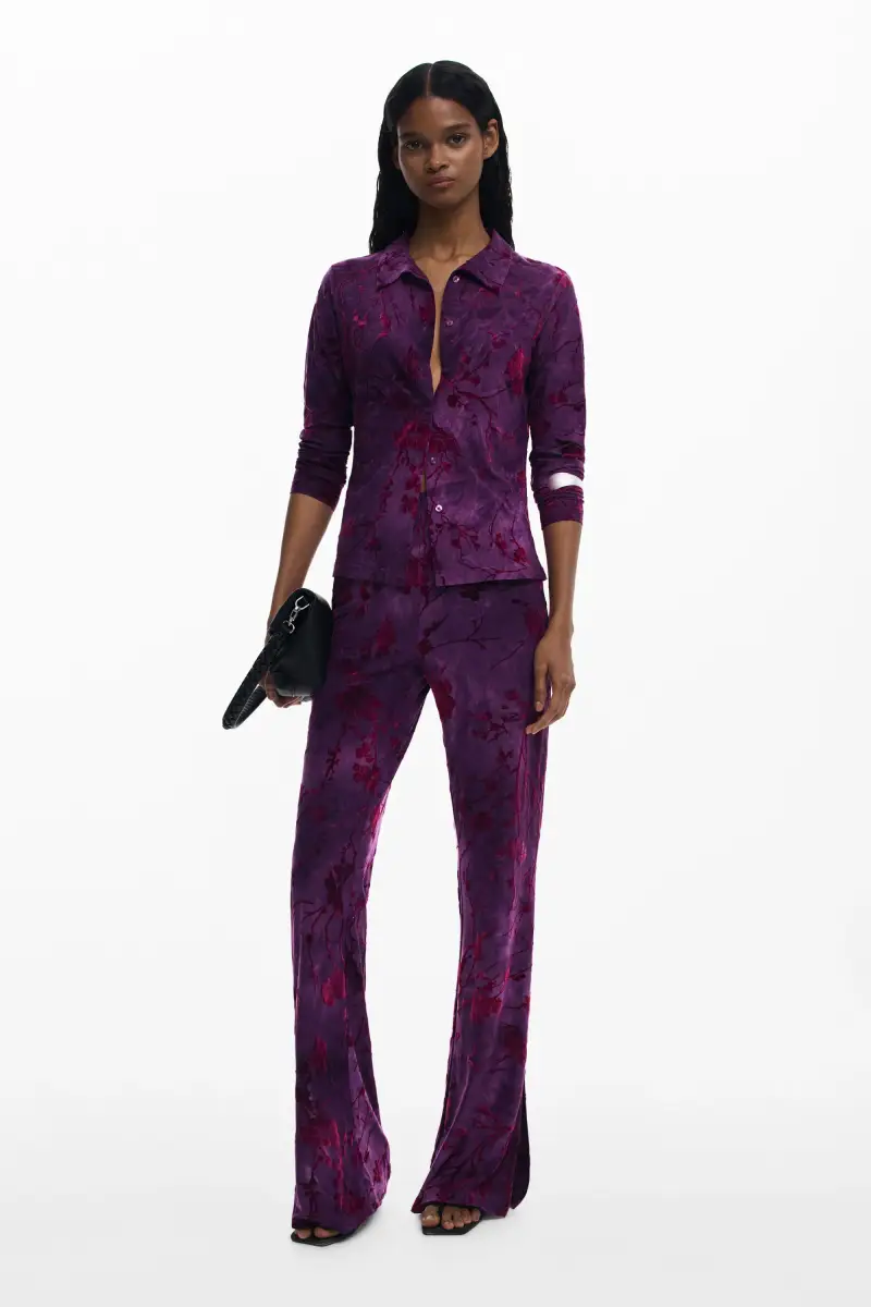 Pantaloni fluidi a zampa con texture RED