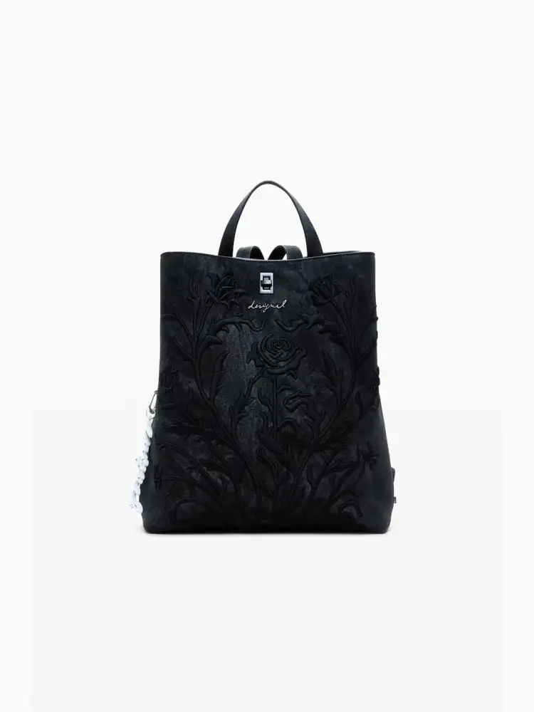 zaino piccolo in ecopelle nera , con fiori incisi effetto 3d, tasca esterna posteriore e vari scomparti interni
