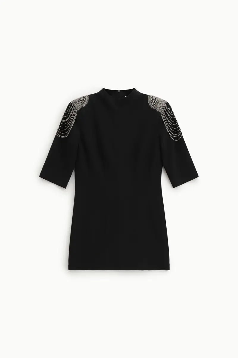 Abito corto con maniche al gomito e dettagli sulle spalle