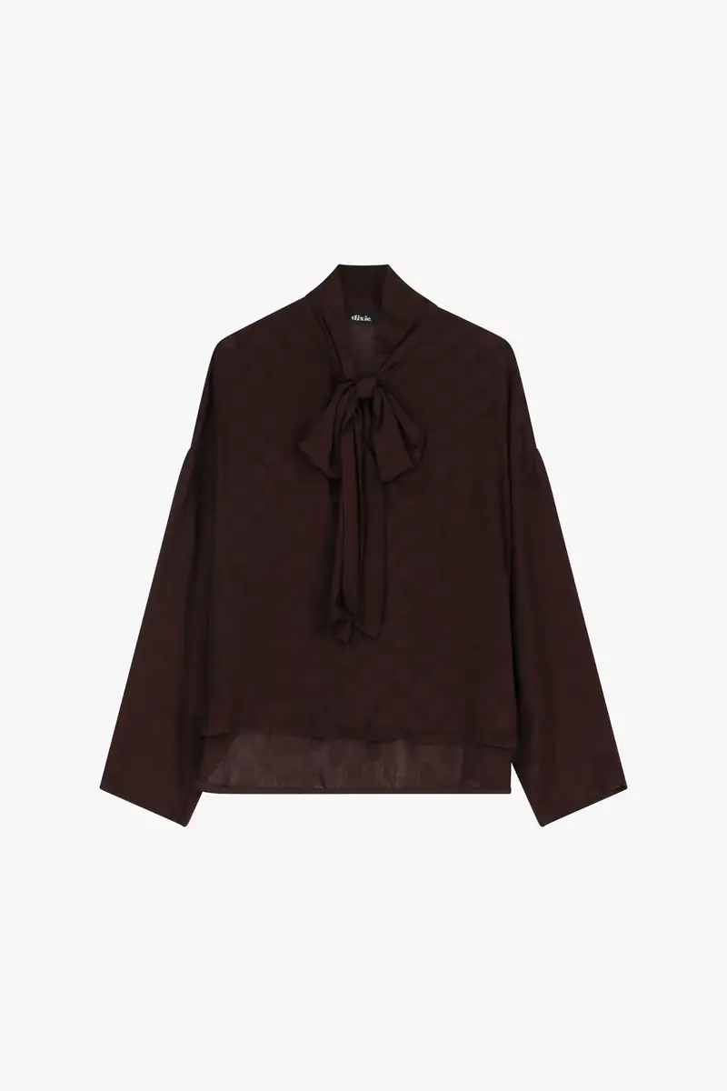 Blusa a pois con fiocco e maniche lunghe