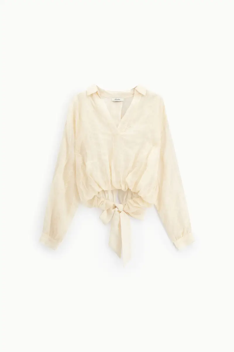 Blusa con maniche lunghe, collo piccolo e nodo frontale