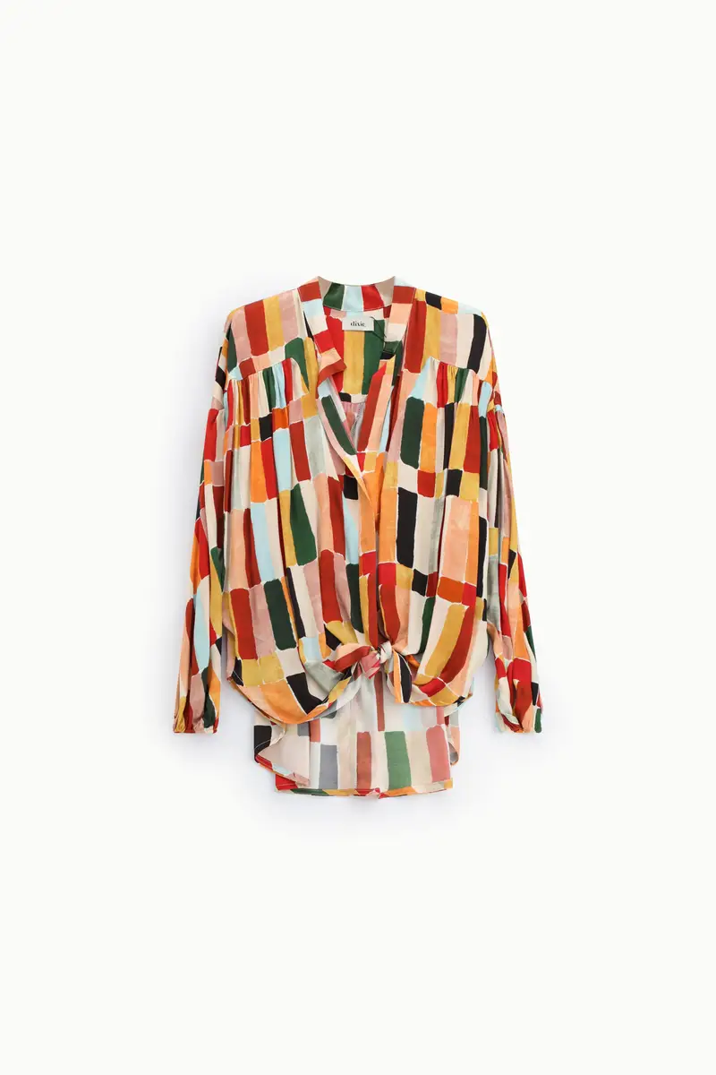 Blusa fantasia con nodo frontale e maniche lunghe