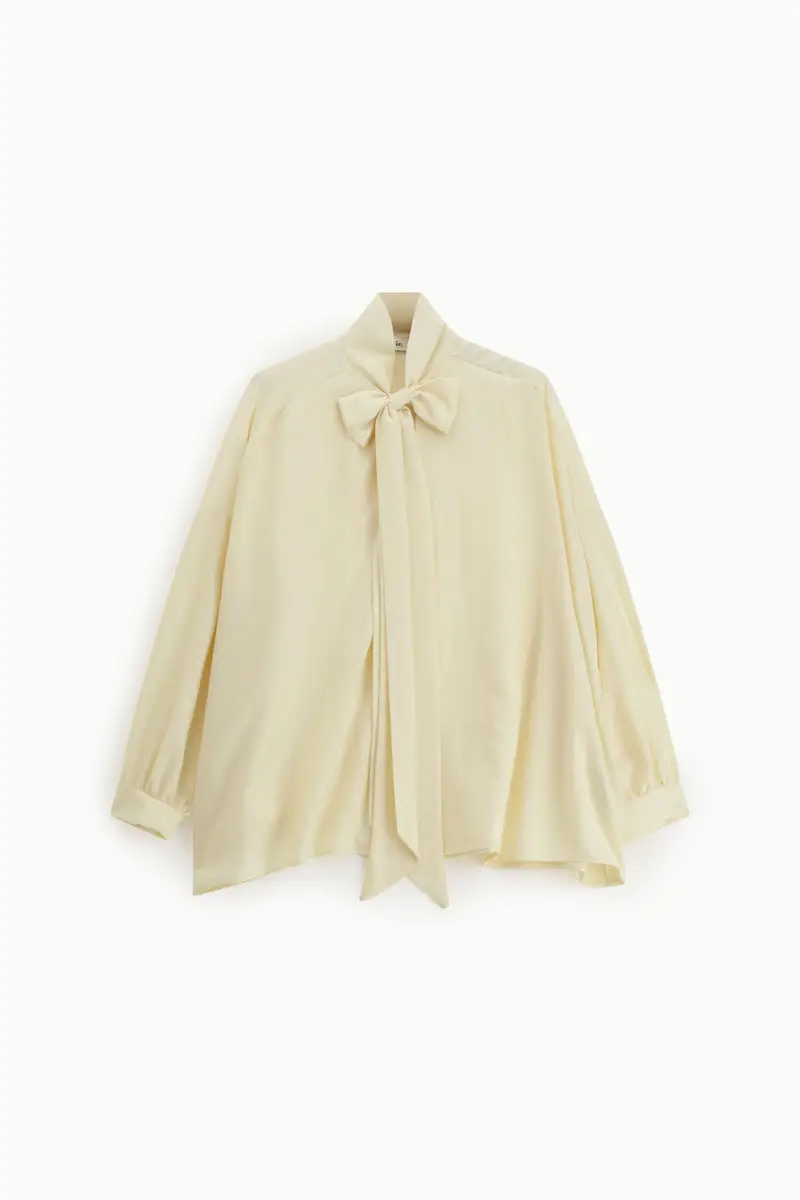 Camicia con fiocco e maniche lunghe ampie