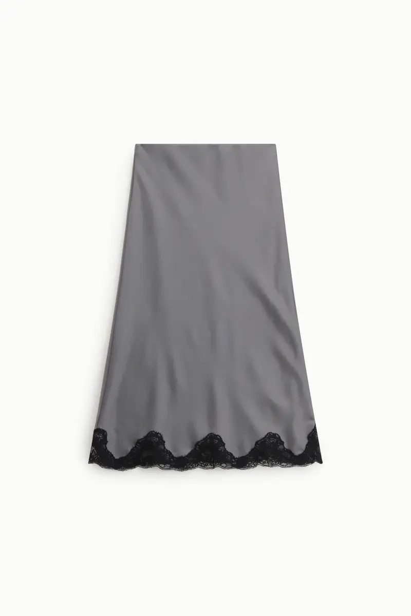 Gonna lunga con bordo smerlato in pizzo