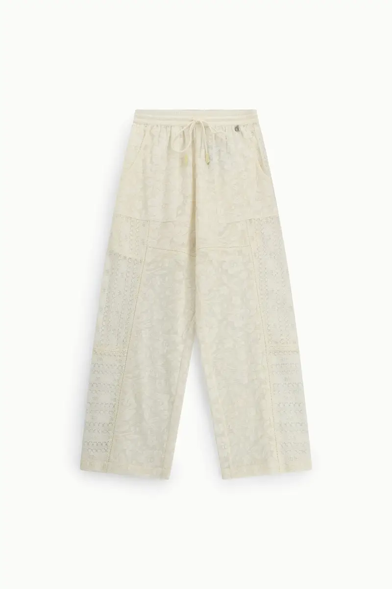 Pantaloni ampi con inserti decorativi