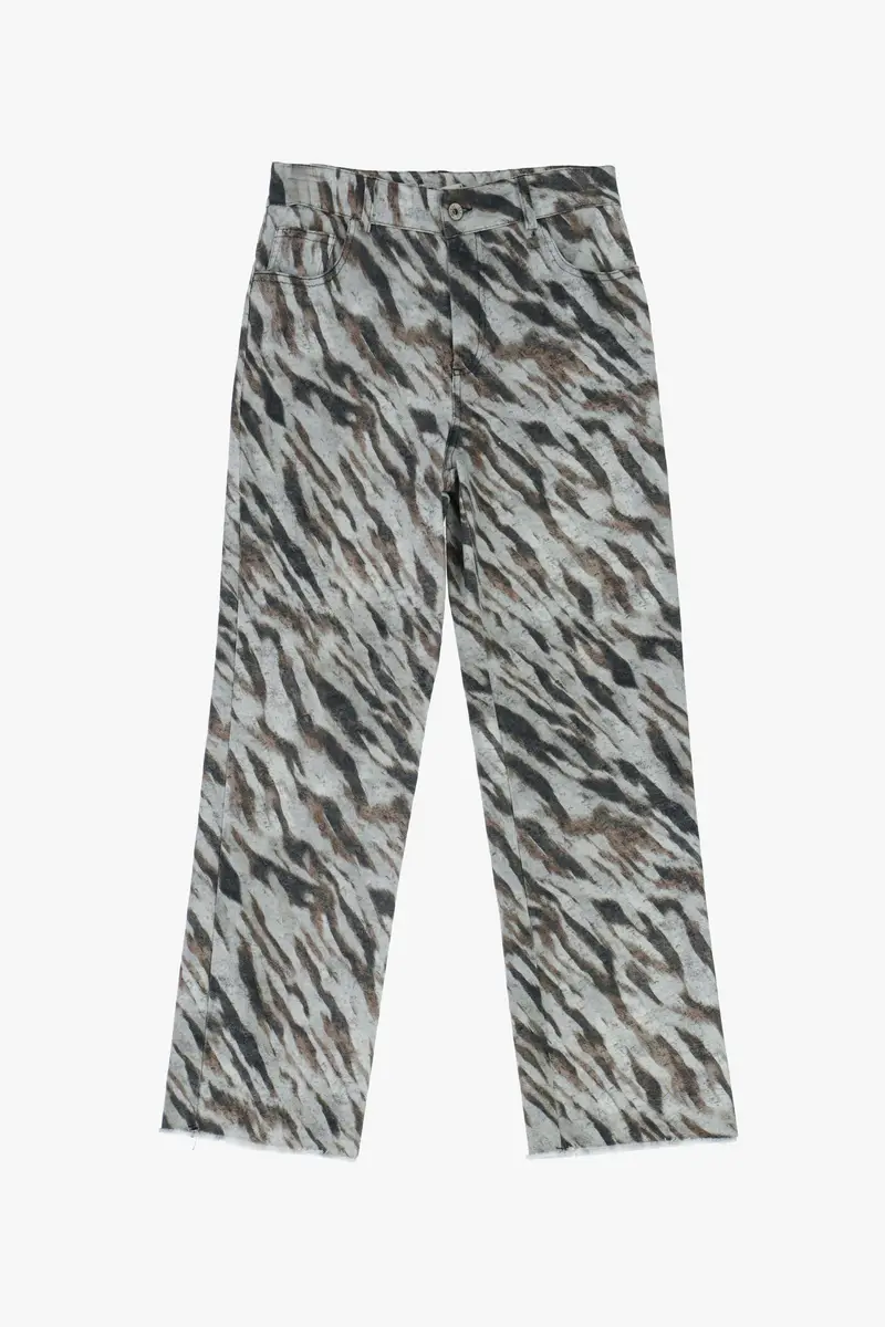 Pantaloni slim-fit fantasia animalier stampa integrale