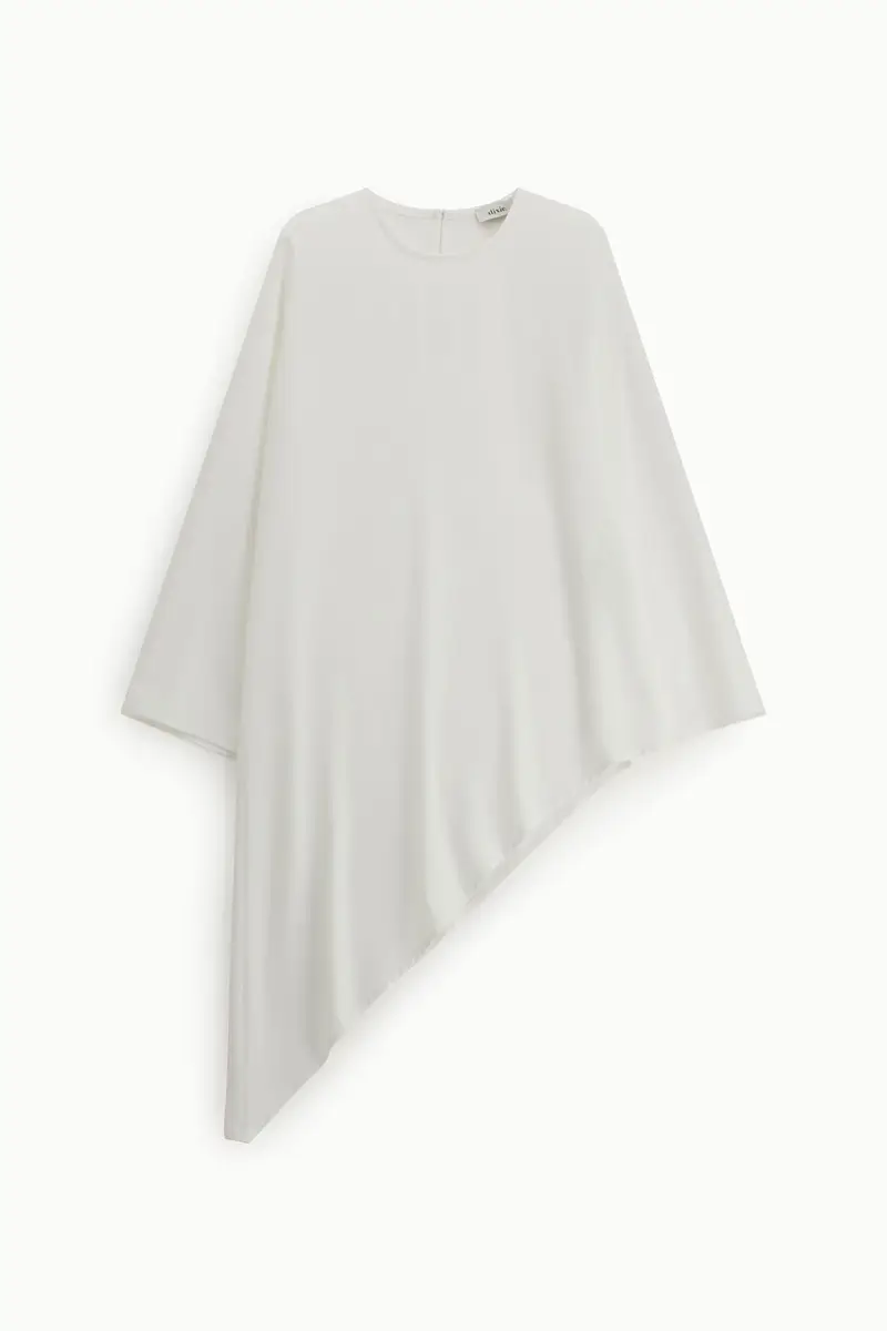 Shirt girocollo lunga con orlo asimmetrico