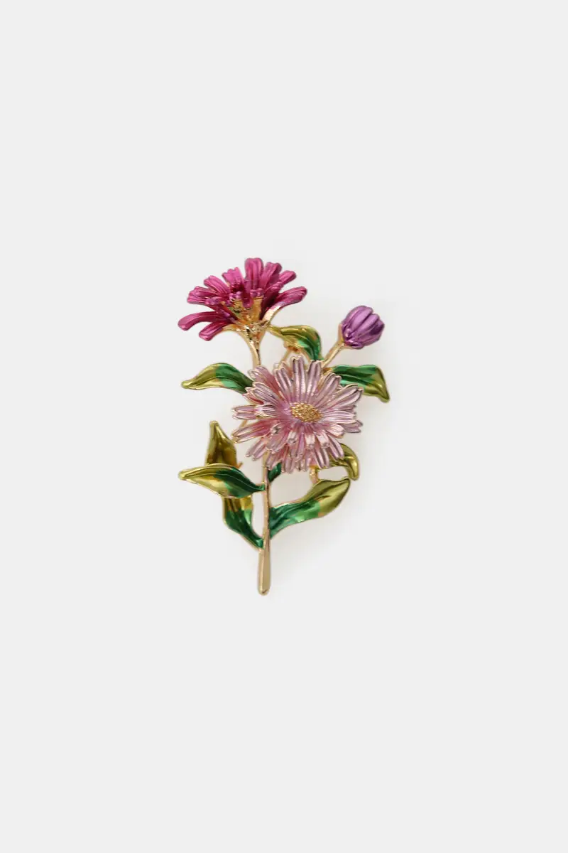 Spilla floreale smaltata con dettagli dorati