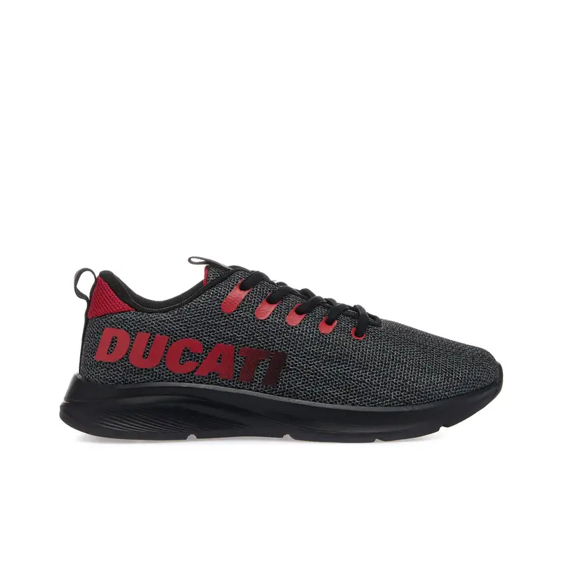 Sneakers running da ragazzo nere con maxi logo