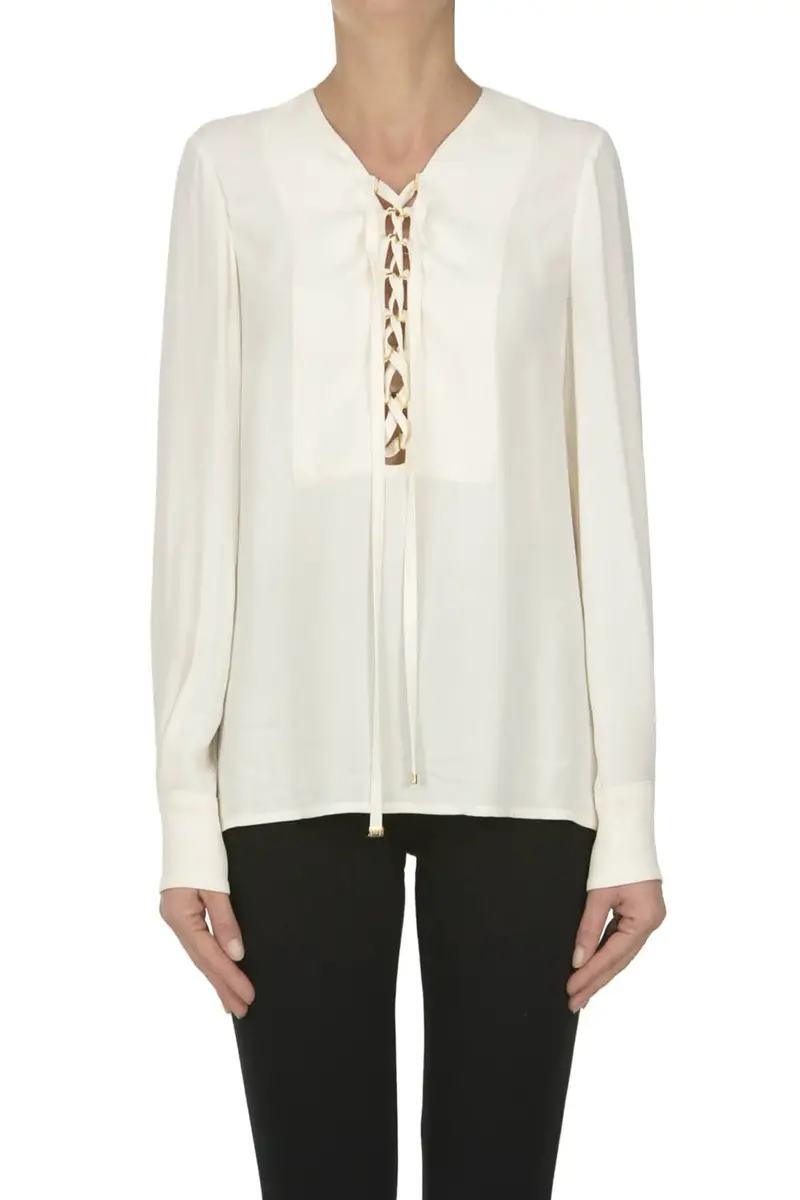 Blusa con lacci frontali