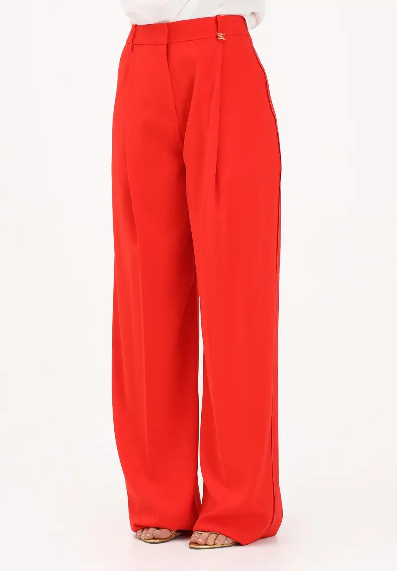 Pantalone elegante rosso da donna con logo charm