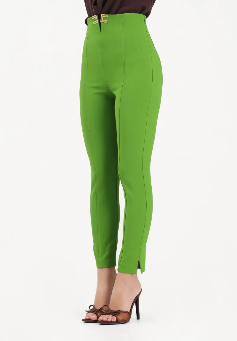 Pantalone elegante verde da donna con dettagli logo