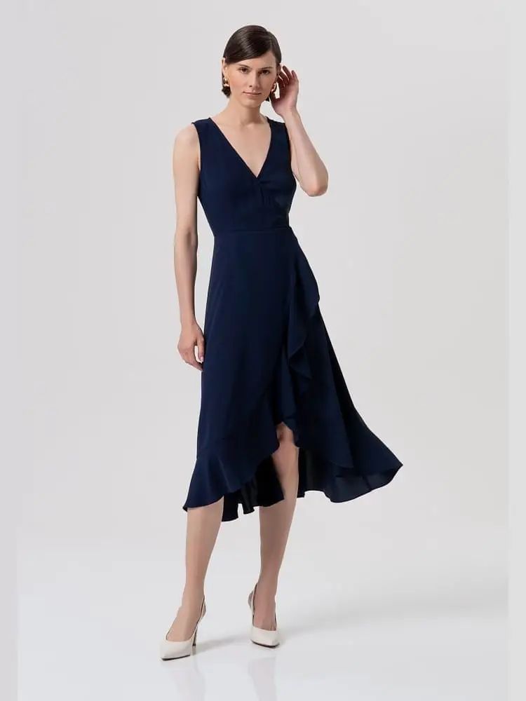 abito a portafoglio blu scuro midi scollo ad incroci, e con gonna con fondo asimmetrico e balza