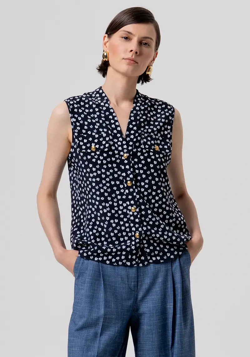 Blusa senza maniche in fantasia floreale