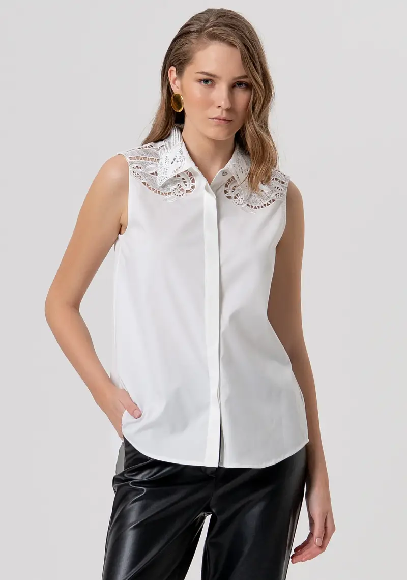 Camicia senza maniche con ricami applicati