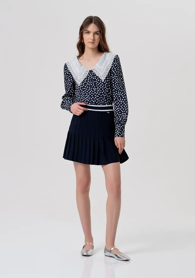 Gonna flare mini in maglia plissettata