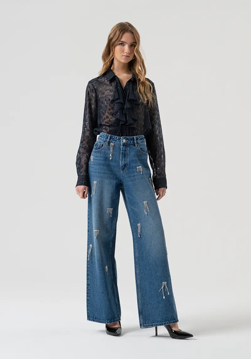 Jeans flare in denim con lavaggio medio e strass luminosi