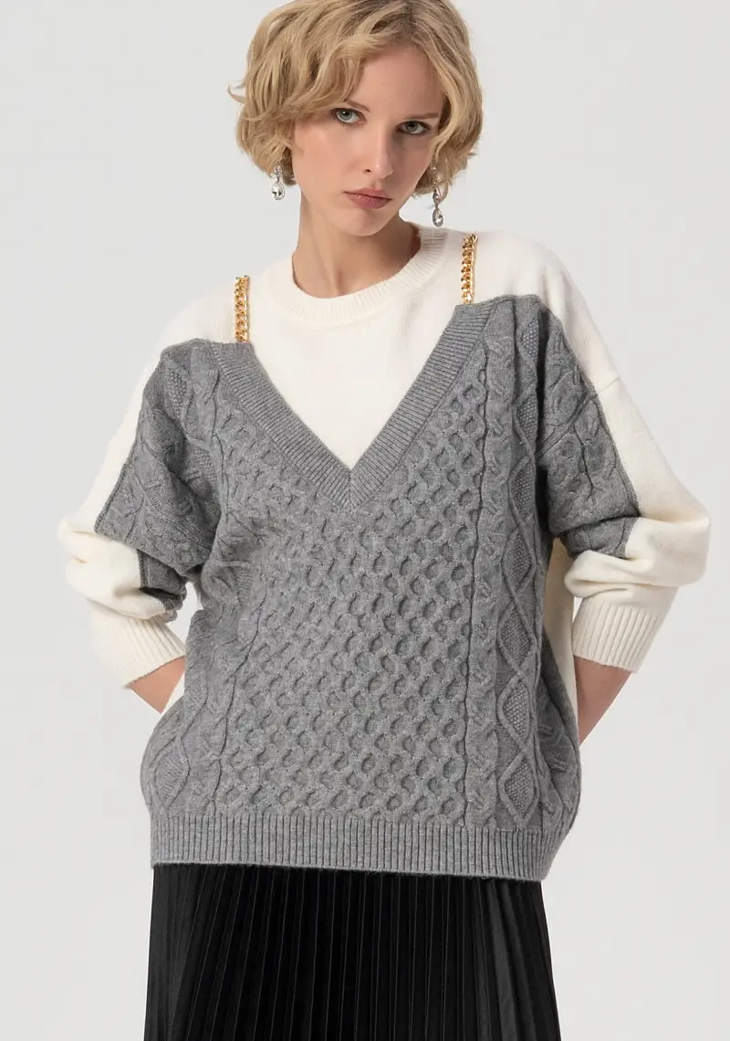 Maglia over con inserto con punto treccia