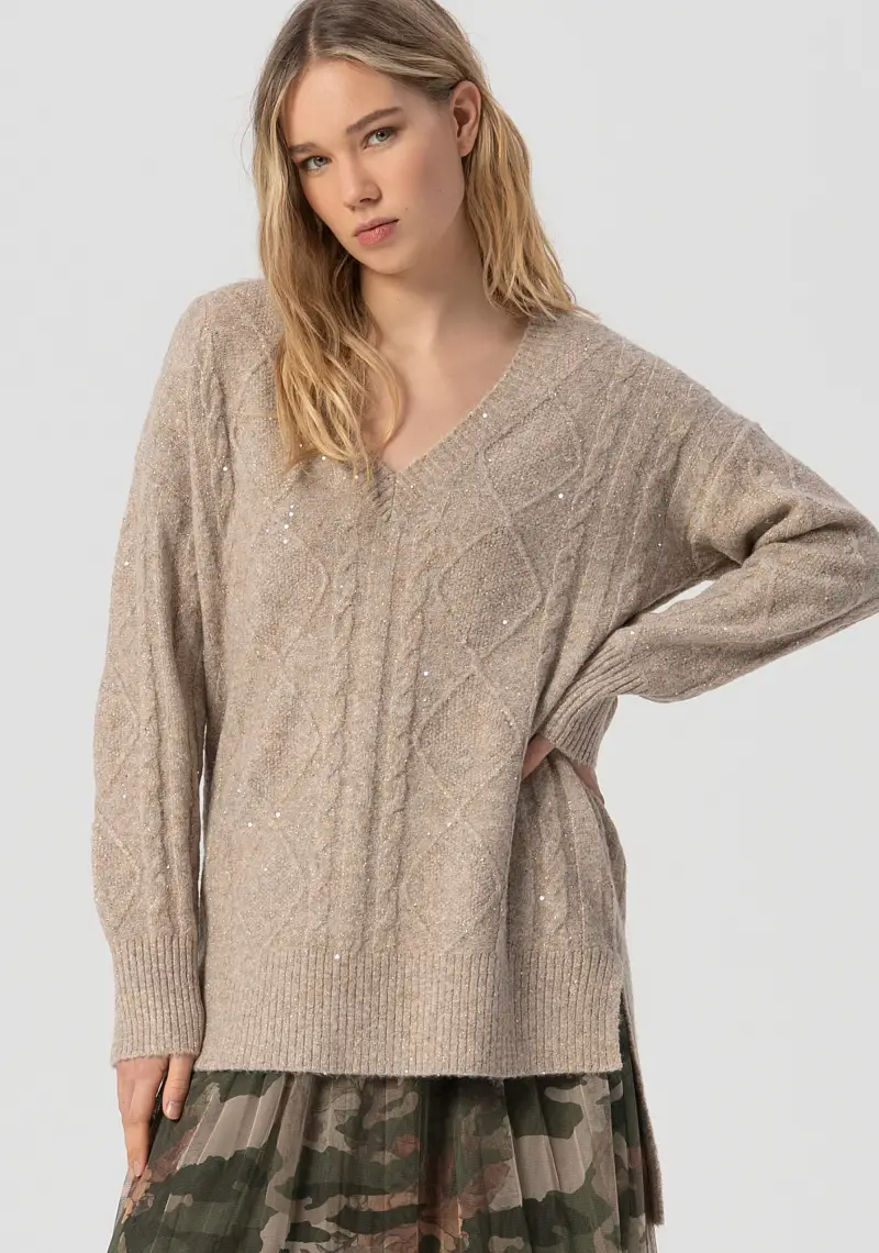 Maglia over lunga con punto treccia