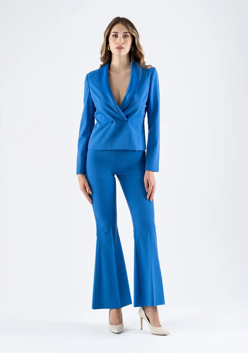 Pantalone a zampa vita alta con taglio fasciante