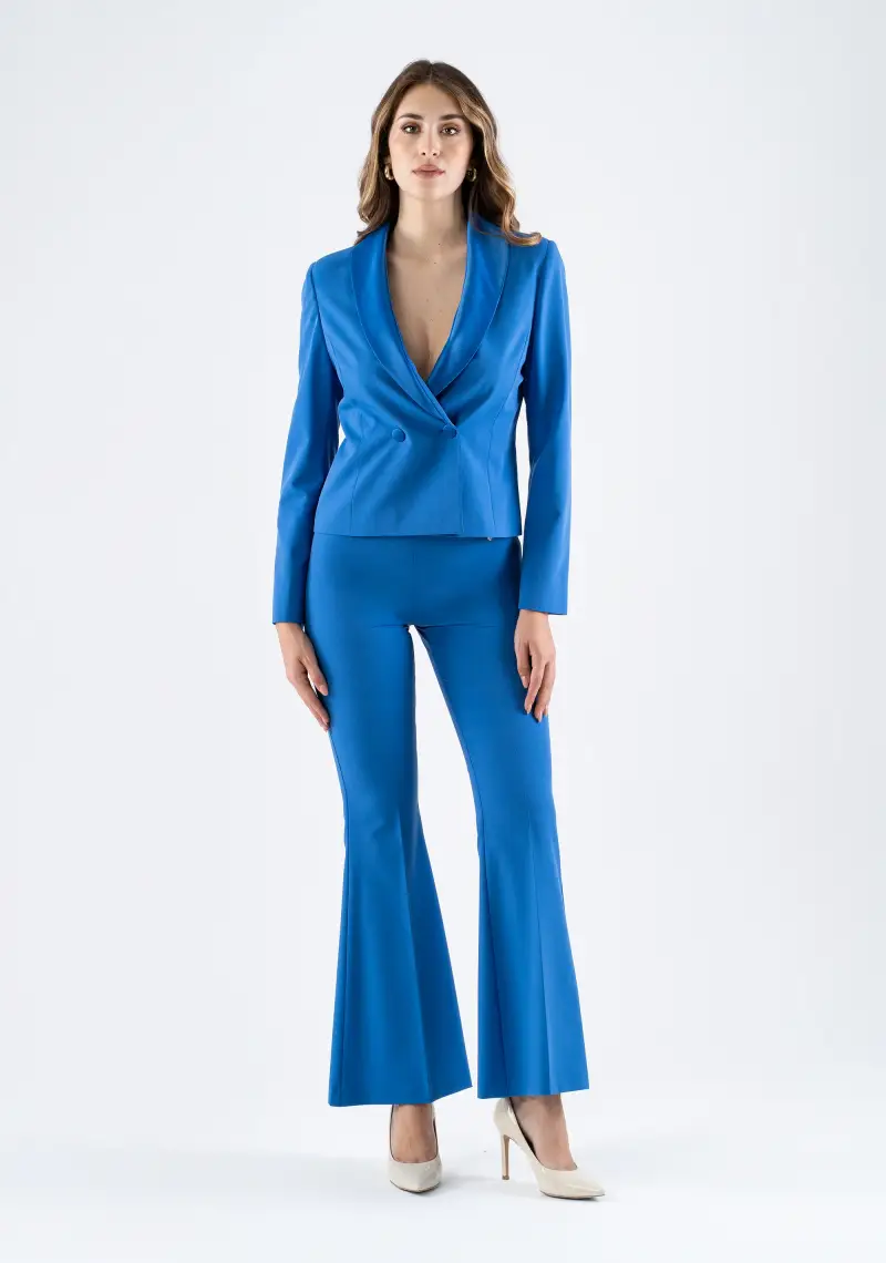 Pantalone a zampa vita alta con taglio fasciante