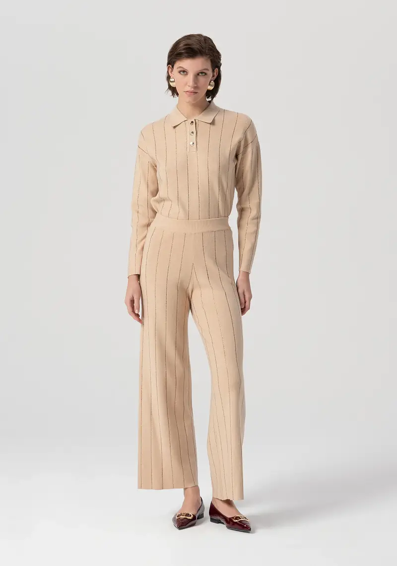 Pantalone flare a palazzo in maglia a coste con strass applicati