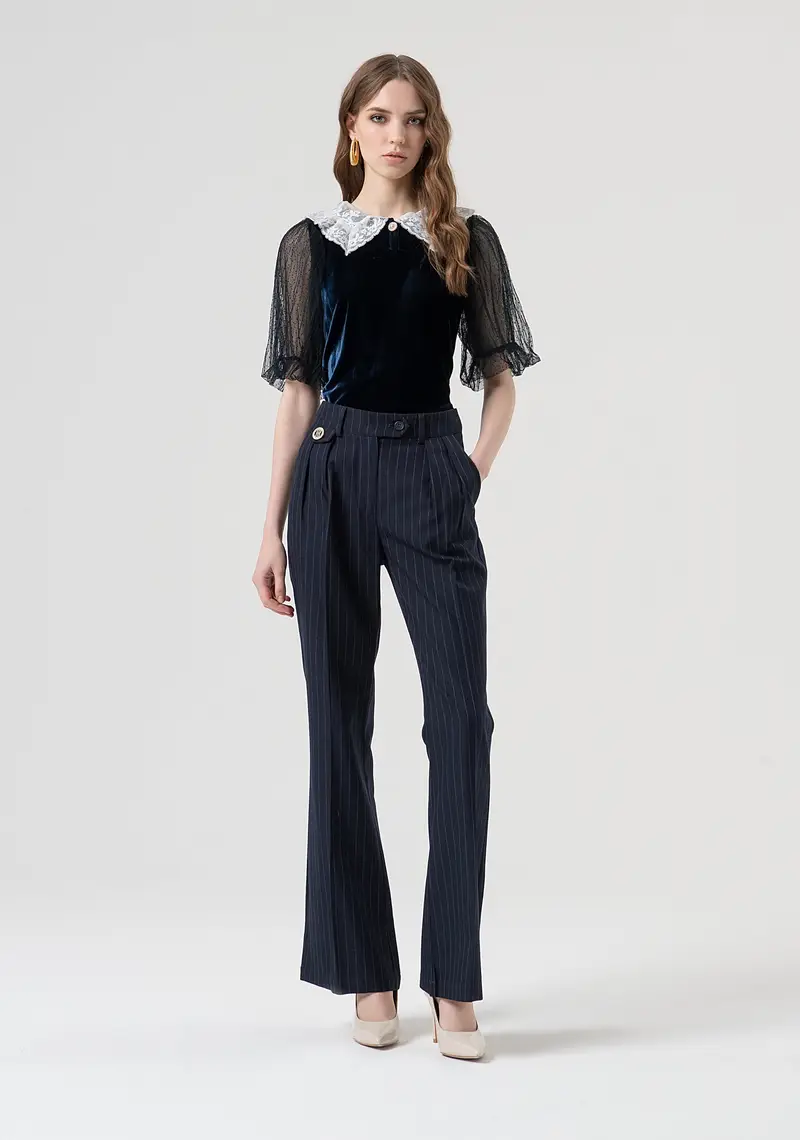Pantalone flare in fantasia gessata