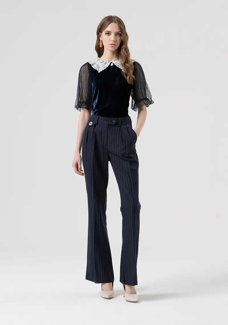 Pantalone flare in fantasia gessata