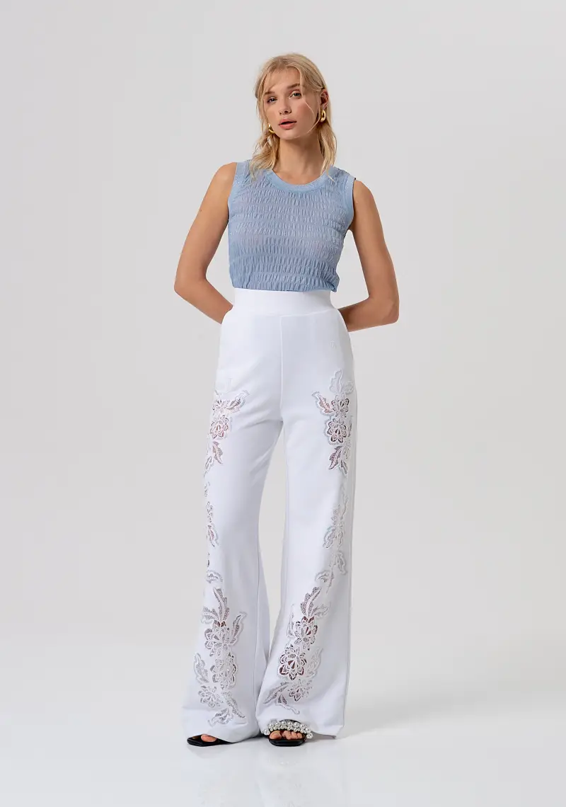 Pantalone flare in felpa con ricami