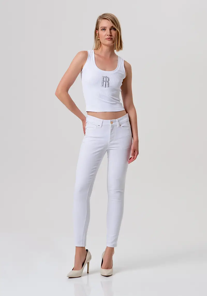 Pantalone slim effetto push up in tessuto bull stretch