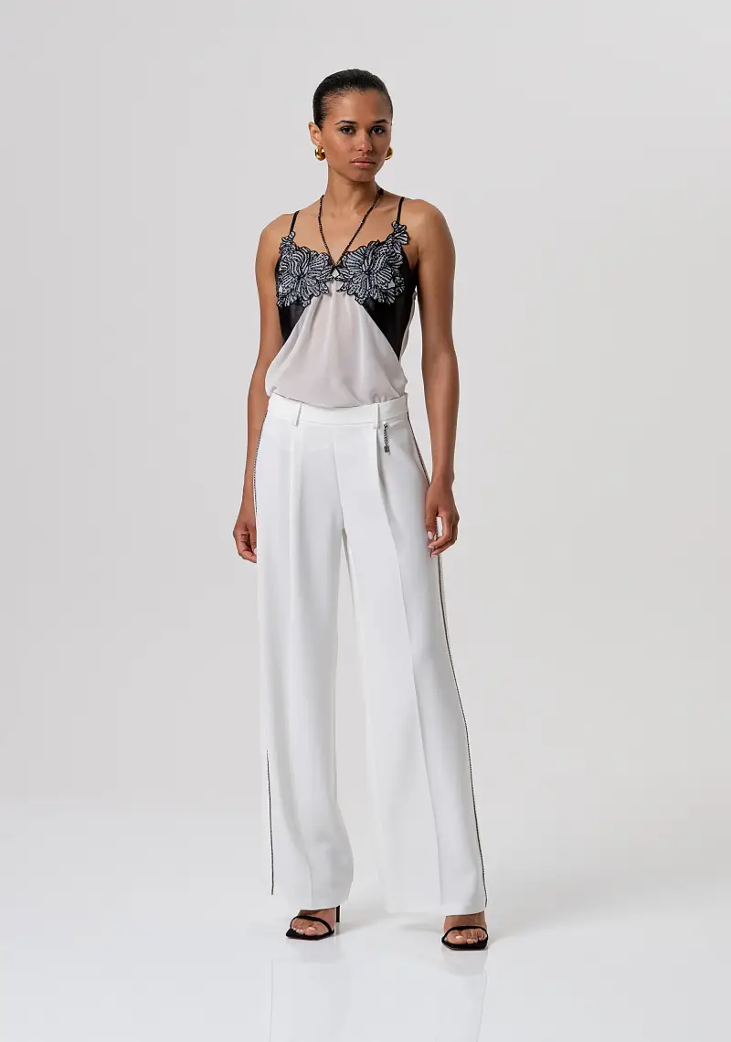 Pantaloni flare a palazzo con pences