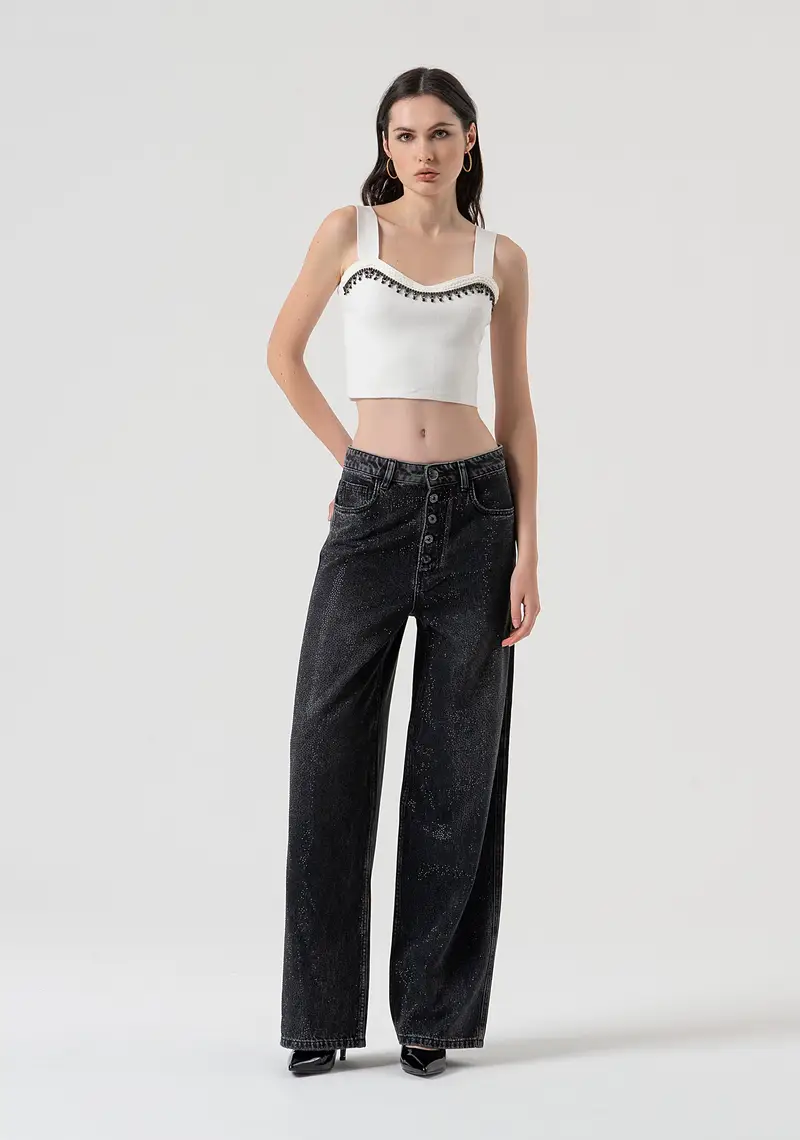 Pantaloni wide palazzo in denim nero con lavaggio scuro e strass