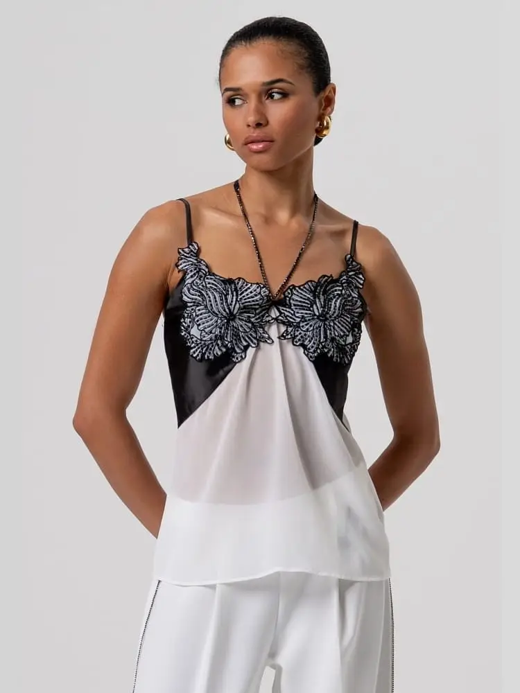 top con patch fiori e strass bianco nero