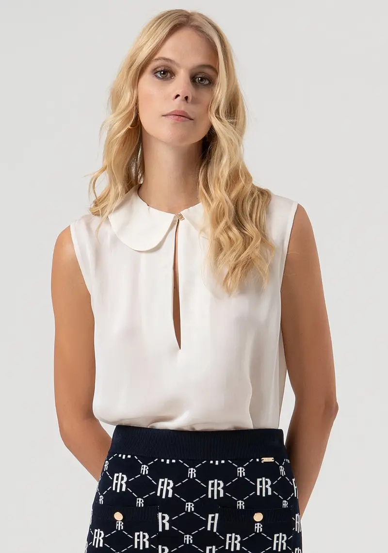 Top senza maniche in tessuto con seta