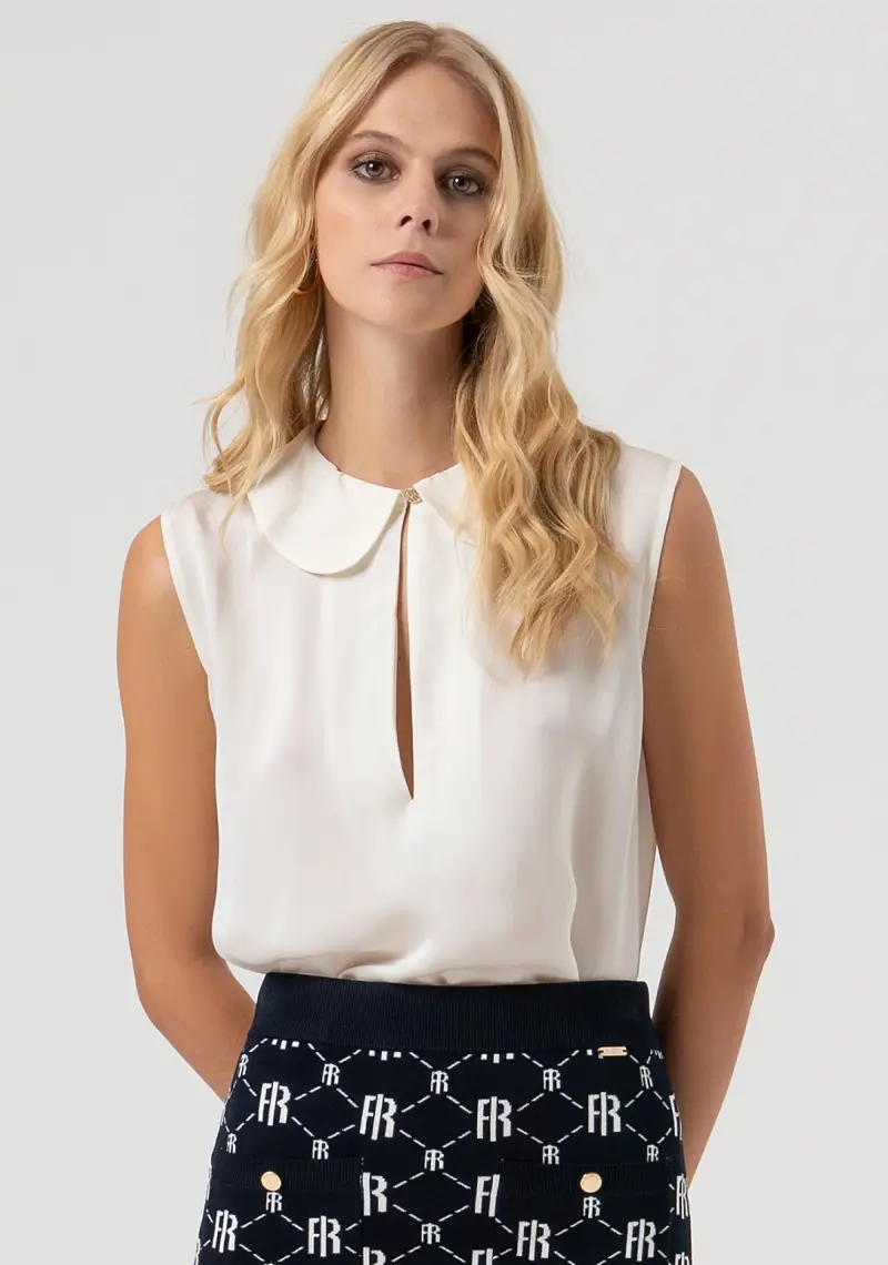 Top senza maniche in tessuto con seta