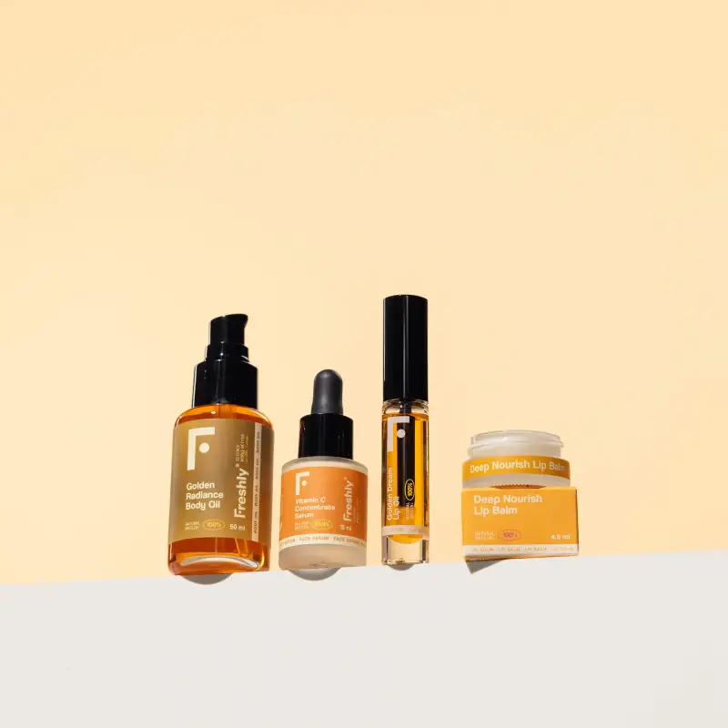 Corpo Cofanetto Vitamin C & Hydration Essentials - Gloss, Siero viso illuminante, Balsamo labbra, Olio per smagliature, Cofanetto vis miniatura 2